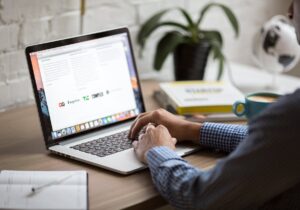 person using macbook pro